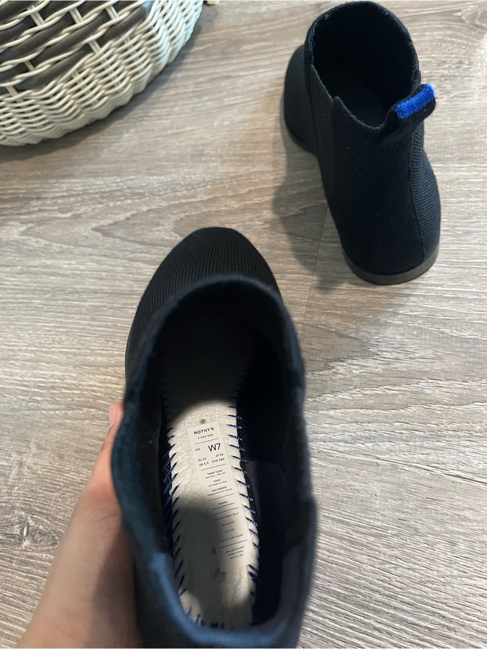 Rothy’s Merino Ankle Boots in onyx black with a distinctive blue pull tab - Picture 13 of 13